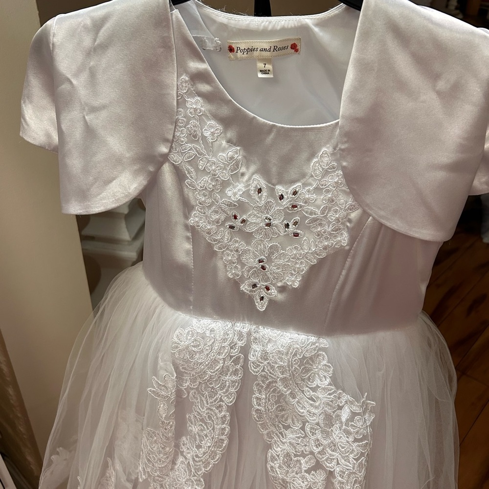 Beautiful!  Worn twice.  Long dress.  Comes with removable little jacket.